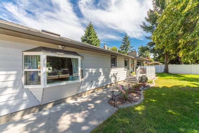 1018 N Fox Rd, Spokane Valley, WA 99206 - view of home's exterior with a chimney