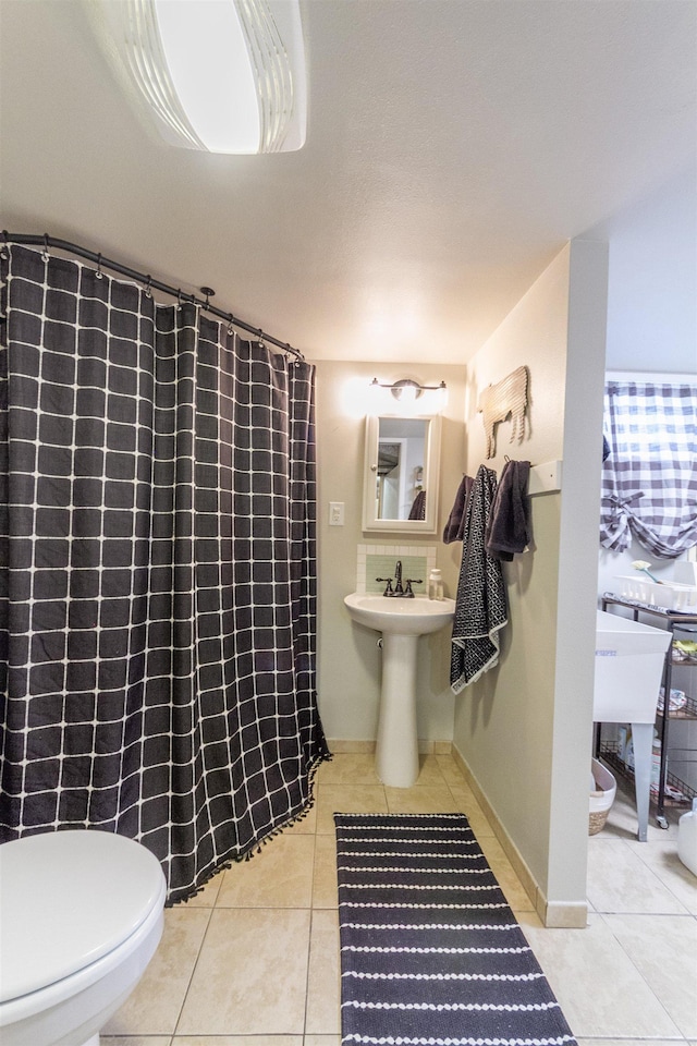 1018 N Fox Rd, Spokane Valley, WA 99206 - bathroom featuring tile patterned flooring and a shower with curtain