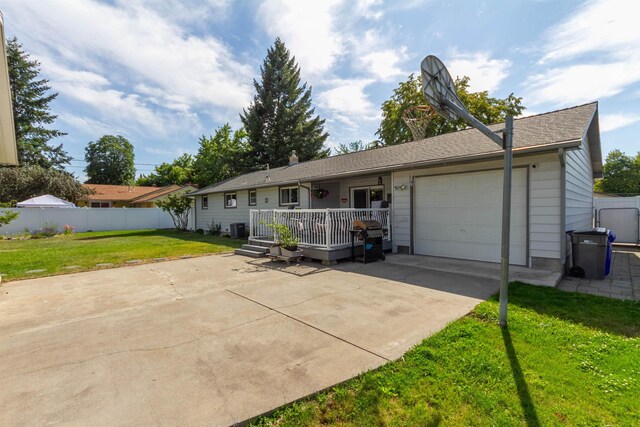 1018 N Fox Rd, Spokane Valley, WA 99206 - ranch-style home with a garage, driveway, and a porch