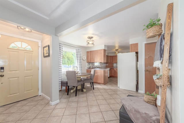 1018 N Fox Rd, Spokane Valley, WA 99206 - foyer with light tile patterned floors and baseboards