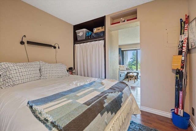 28600 N Mt Spokane Park Dr Unit 612, Mead, WA 99021 - bedroom featuring wood finished floors and baseboards