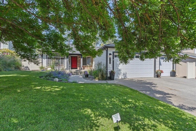 4108 S Greystone Ln, Spokane, WA 99223 - view of front facade featuring a front lawn, a garage, and asphalt driveway