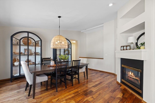 4108 S Greystone Ln, Spokane, WA 99223 - dining space with wood finished floors and a glass covered fireplace