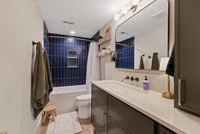 4108 S Greystone Ln, Spokane, WA 99223 - bathroom featuring vanity, shower / tub combo, wood finished floors, and recessed lighting