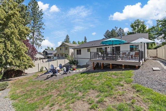 4108 S Greystone Ln, Spokane, WA 99223 - rear view of house featuring a fenced backyard, a deck, an outdoor fire pit, and stairs