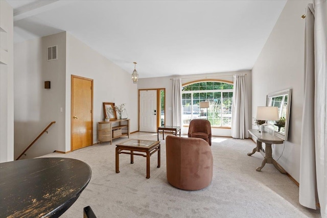 4108 S Greystone Ln, Spokane, WA 99223 - carpeted living room featuring lofted ceiling and baseboards