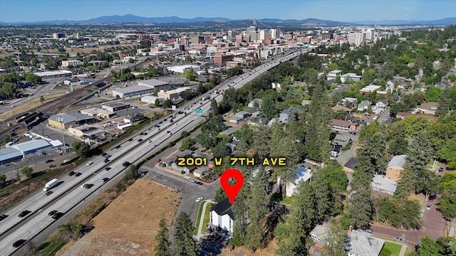 2001 W 7th Ave, Spokane, WA 99204 - aerial view of property and surrounding area featuring a highway and a mountain backdrop