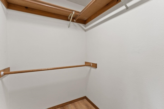 3827 E Funk Ave, Spokane, WA 99223 - walk in closet featuring light wood-type flooring