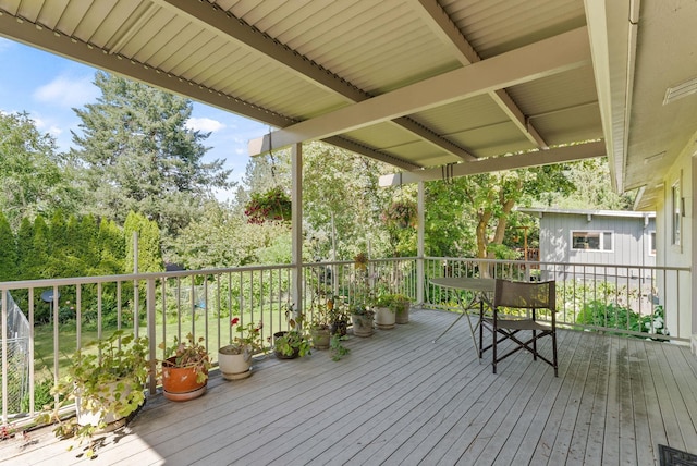 3827 E Funk Ave, Spokane, WA 99223 - wooden terrace with view of wooded area