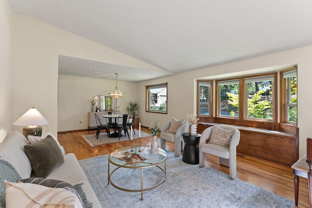 3827 E Funk Ave, Spokane, WA 99223 - living room with wood finished floors and vaulted ceiling