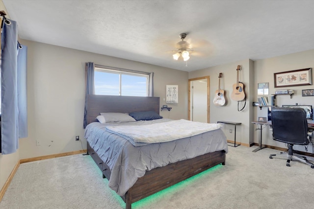 36127 N Hart Rd, Davenport, WA 99122 - bedroom featuring light carpet, an office area, and ceiling fan