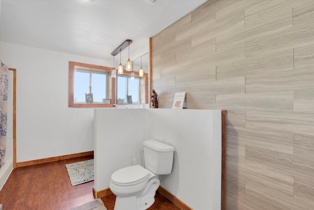 36127 N Hart Rd, Davenport, WA 99122 - bathroom featuring wood finished floors and curtained shower