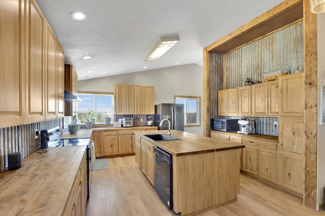 36127 N Hart Rd, Davenport, WA 99122 - kitchen with wooden counters, stainless steel appliances, light brown cabinets, exhaust hood, and lofted ceiling
