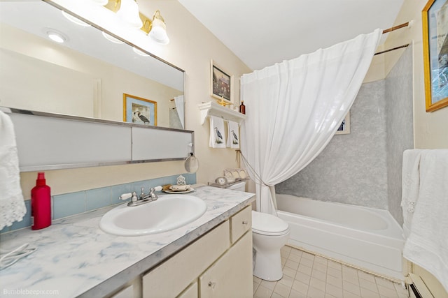 4511 N Stevenson Rd, Otis Orchards, WA 99027 - full bath featuring shower / bath combo with shower curtain, vanity, and tile patterned floors