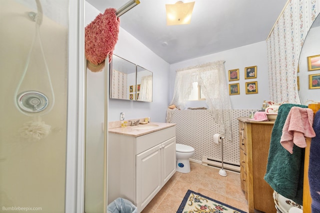 4511 N Stevenson Rd, Otis Orchards, WA 99027 - bathroom featuring a baseboard heating unit, vanity, and a shower with door