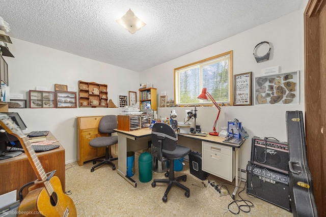 4511 N Stevenson Rd, Otis Orchards, WA 99027 - office area featuring a textured ceiling, baseboard heating, and light flooring