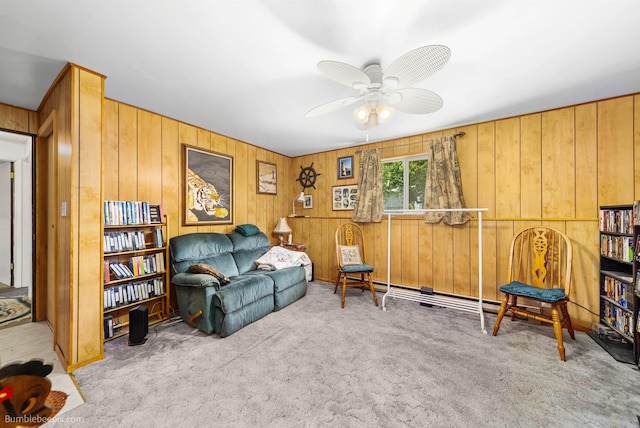 4511 N Stevenson Rd, Otis Orchards, WA 99027 - sitting room with carpet floors, ceiling fan, and wood walls