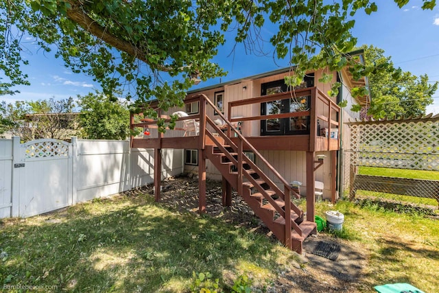 4511 N Stevenson Rd, Otis Orchards, WA 99027 - view of playground with a gate, stairs, and a deck