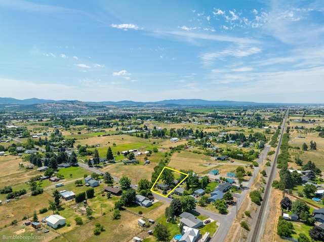 4511 N Stevenson Rd, Otis Orchards, WA 99027 - aerial overview of property's location featuring property boundaries highlighted and a mountainous background