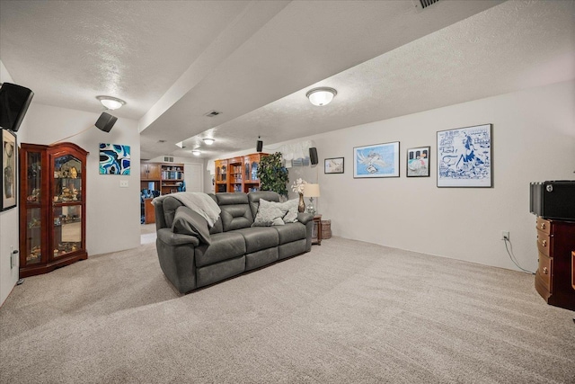 6310 W Sundance Dr, Spokane, WA 99208 - carpeted living area with a textured ceiling