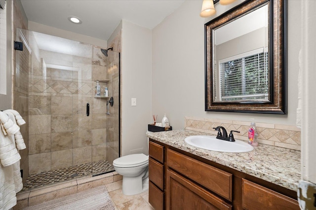 6310 W Sundance Dr, Spokane, WA 99208 - bathroom featuring vanity, a shower stall, and recessed lighting