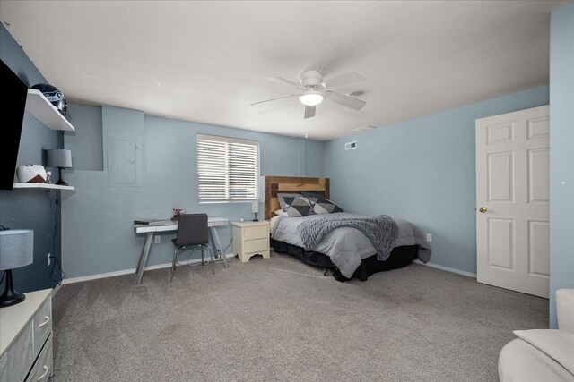 6310 W Sundance Dr, Spokane, WA 99208 - carpeted bedroom with ceiling fan and a desk