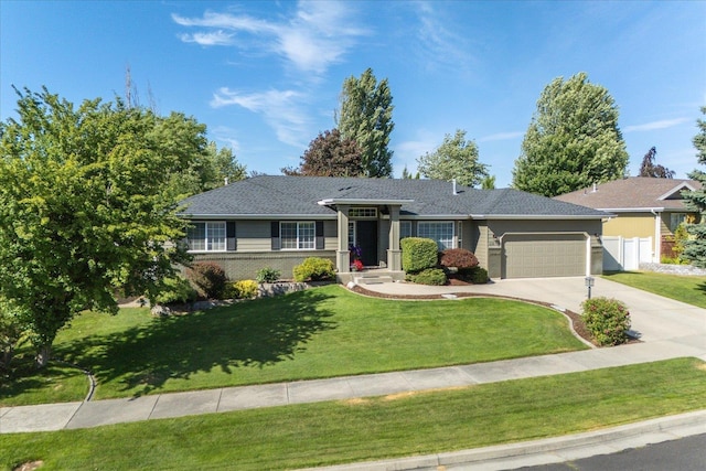6310 W Sundance Dr, Spokane, WA 99208 - ranch-style home featuring an attached garage and driveway