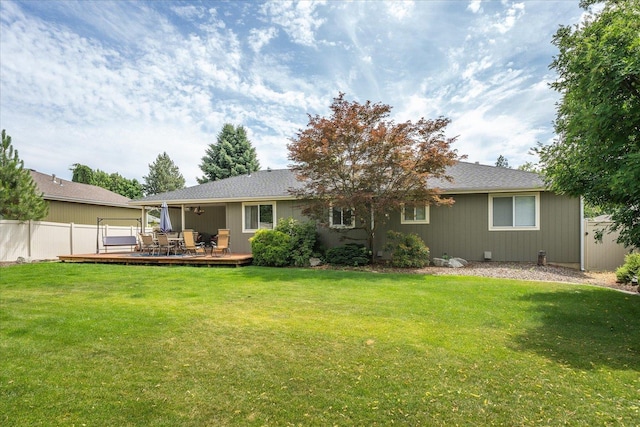 6310 W Sundance Dr, Spokane, WA 99208 - rear view of property with a wooden deck