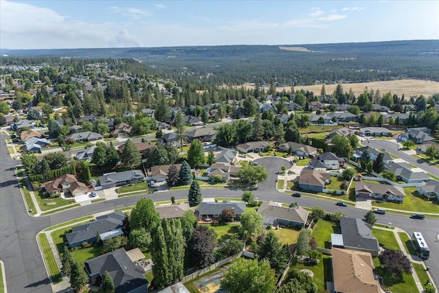 6310 W Sundance Dr, Spokane, WA 99208 - view of property location with nearby suburban area and a heavily wooded area