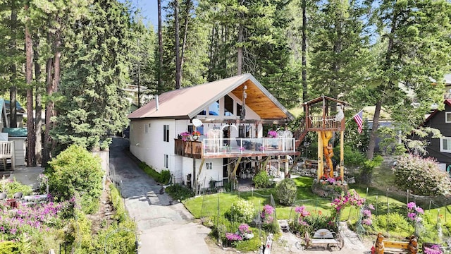 3930 N Deer Lake Rd, Loon Lake, WA 99148 - back of house featuring a deck