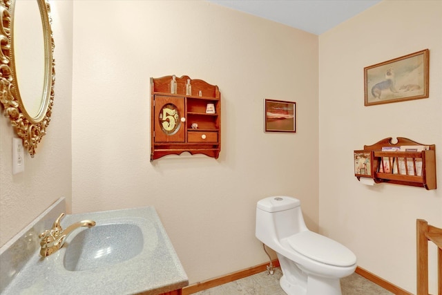 3930 N Deer Lake Rd, Loon Lake, WA 99148 - bathroom with toilet and vanity