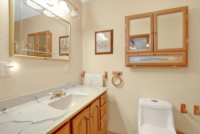 3930 N Deer Lake Rd, Loon Lake, WA 99148 - bathroom featuring toilet and vanity