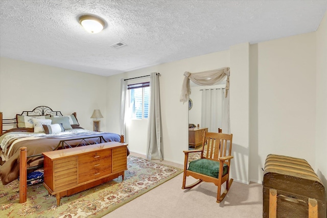 3930 N Deer Lake Rd, Loon Lake, WA 99148 - bedroom featuring light colored carpet and a textured ceiling