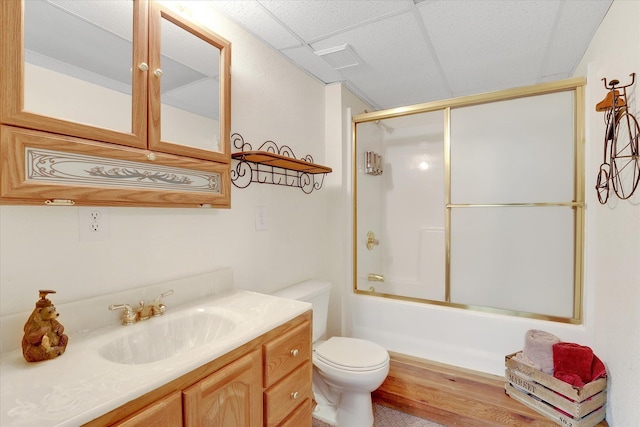 3930 N Deer Lake Rd, Loon Lake, WA 99148 - bathroom with a paneled ceiling, vanity, wood finished floors, and enclosed tub / shower combo