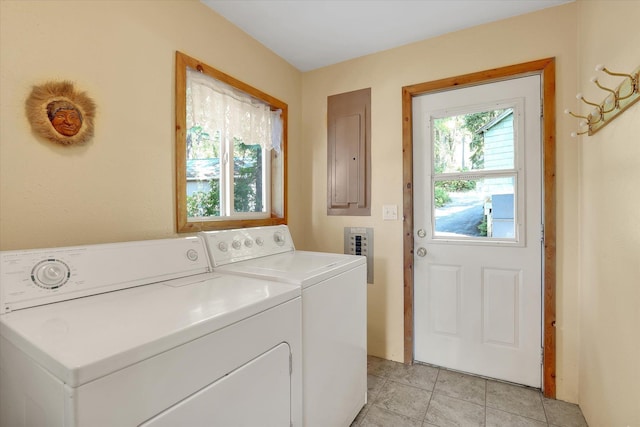 3930 N Deer Lake Rd, Loon Lake, WA 99148 - washroom featuring independent washer and dryer, electric panel, and light tile patterned floors