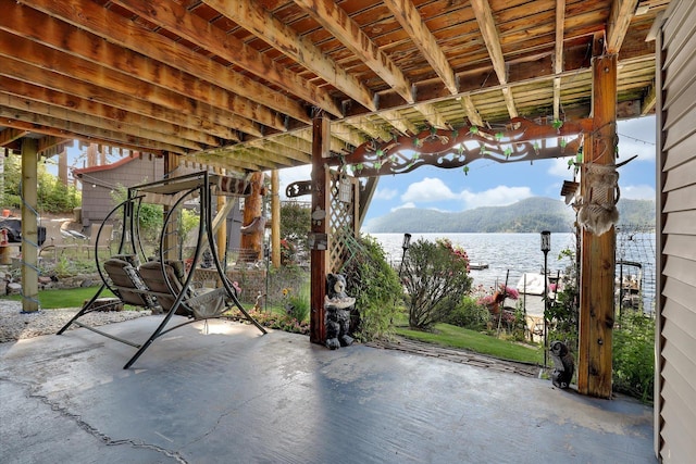 3930 N Deer Lake Rd, Loon Lake, WA 99148 - view of patio with a water and mountain view