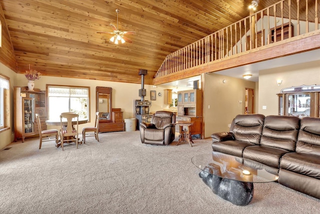 3930 N Deer Lake Rd, Loon Lake, WA 99148 - carpeted living area featuring high vaulted ceiling, wood ceiling, ceiling fan, and a fireplace