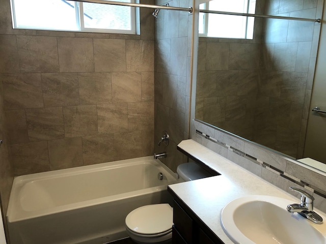 8516 N Summerhill Ln, Spokane, WA 99208 - full bathroom featuring plenty of natural light, vanity, bathtub / shower combination, and decorative backsplash