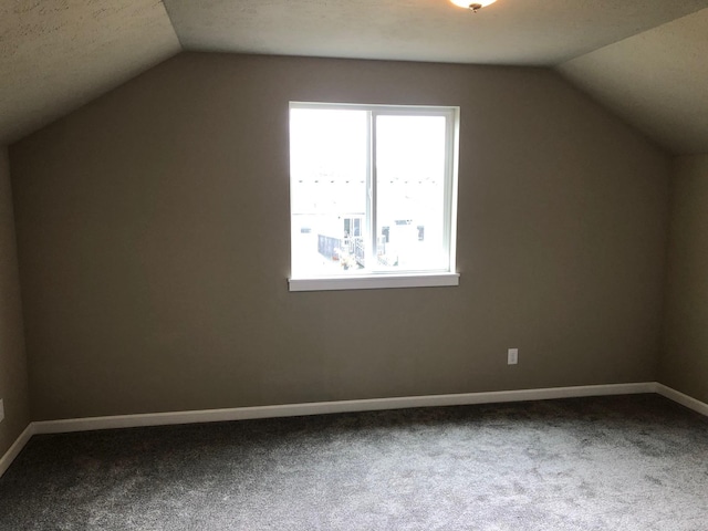 8516 N Summerhill Ln, Spokane, WA 99208 - additional living space with vaulted ceiling and carpet
