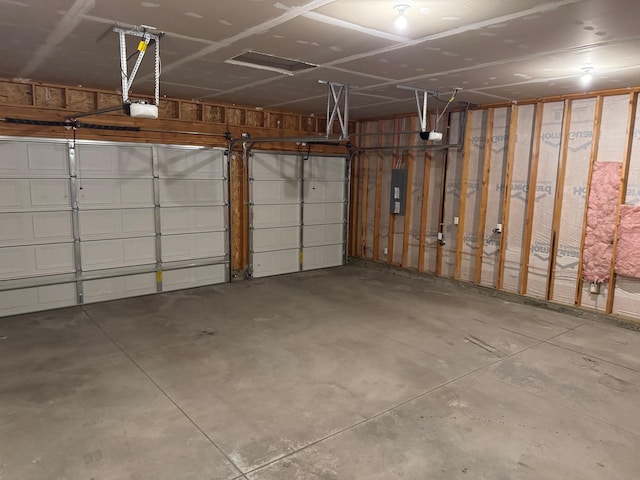8516 N Summerhill Ln, Spokane, WA 99208 - garage with a garage door opener and electric panel