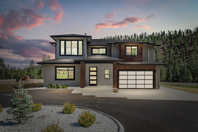 16215 W Coulee Hite Rd, Spokane, WA 99224 - prairie-style house featuring concrete driveway and an attached garage