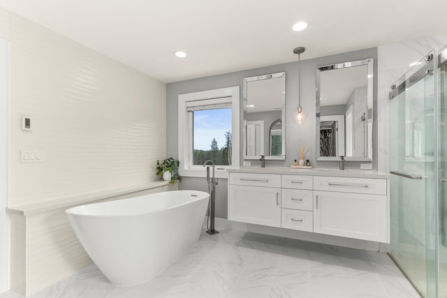 16215 W Coulee Hite Rd, Spokane, WA 99224 - full bathroom featuring a soaking tub, double vanity, a shower stall, marble finish floors, and recessed lighting
