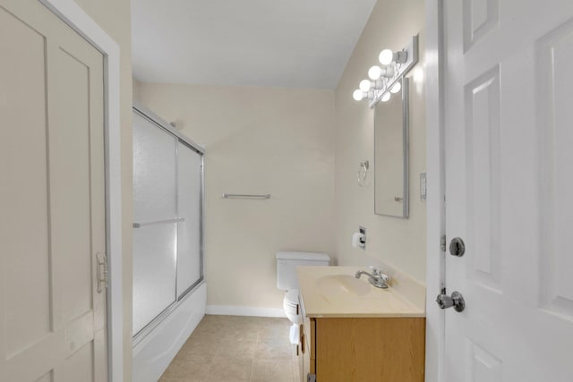 1407 E Broad Ave, Spokane, WA 99207 - bathroom featuring vanity, tile patterned flooring, and combined bath / shower with glass door