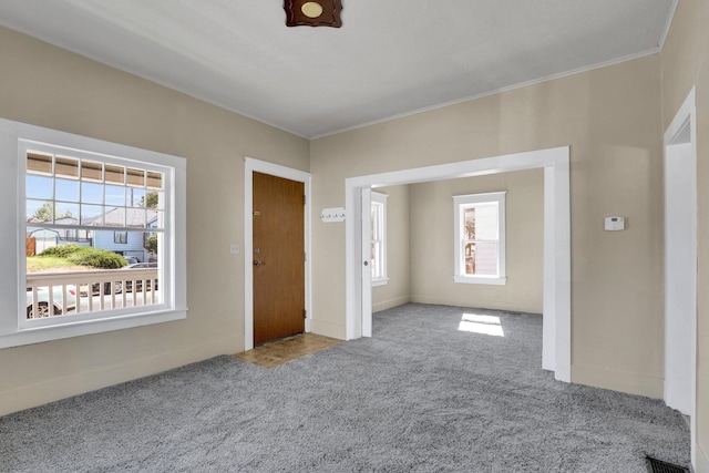1407 E Broad Ave, Spokane, WA 99207 - unfurnished room with carpet, plenty of natural light, and ornamental molding