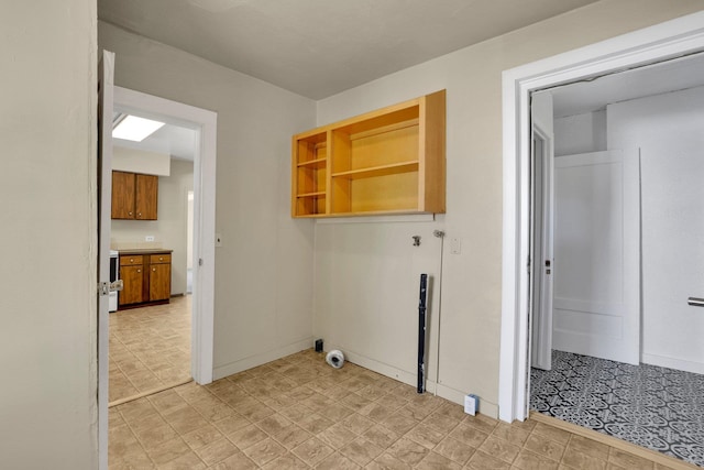 1407 E Broad Ave, Spokane, WA 99207 - laundry room with baseboards