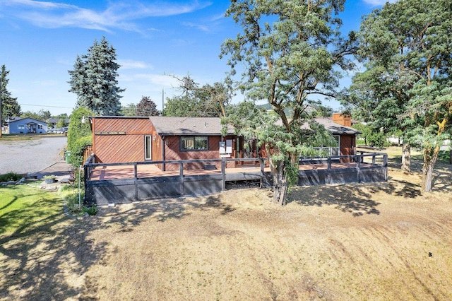 3425 E Upriver Dr, Spokane, WA 99217 - rear view of property with a deck
