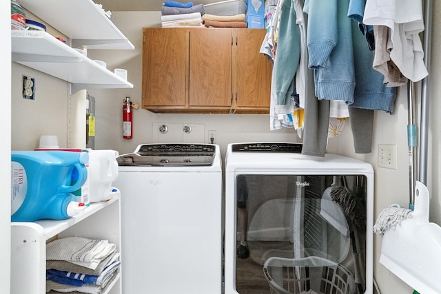 3425 E Upriver Dr, Spokane, WA 99217 - laundry room featuring separate washer and dryer and cabinet space