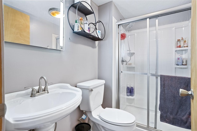 3425 E Upriver Dr, Spokane, WA 99217 - full bathroom with a sink and a stall shower