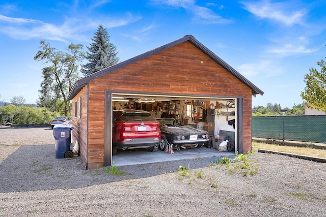 3425 E Upriver Dr, Spokane, WA 99217 - view of parking with a detached garage