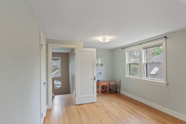 1103 W 20th Ave, Spokane, WA 99203 - unfurnished bedroom featuring light wood finished floors and baseboards